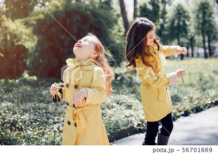 Cute kids plaiyng on a rainy day 56701669