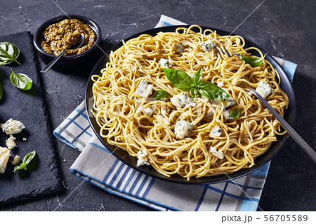 close-up of tasty Spaghetti with basil pesto 56705589