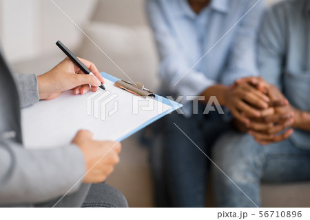 African American Spouses Holding Hands Visiting Marital Therapist 56710896