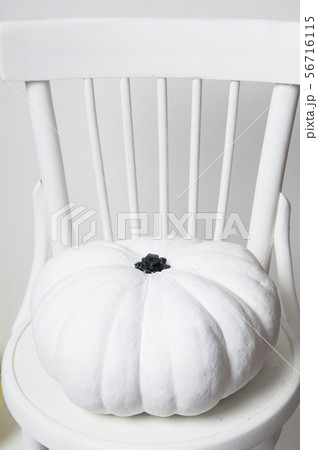 halloween pumpkin on a chair 56716115