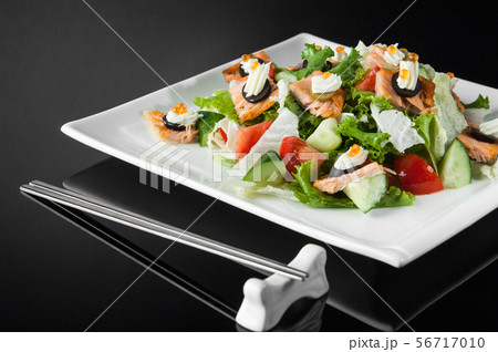 sushi in a plate on a black background 56717010