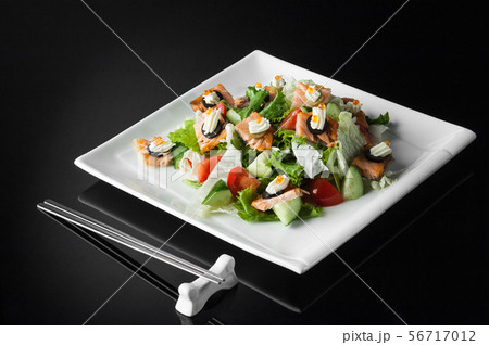 sushi in a plate on a black background 56717012