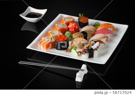 sushi in a plate on a black background sushi in a plate on a black background 56717024