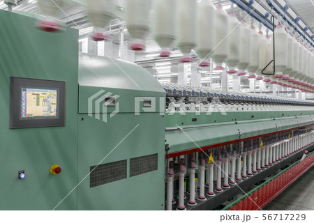 spools of thread at a textile factory spools of thread at a textile factory 56717229