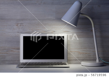 Home office workplace with blank screen laptop Home office workplace with blank screen laptop 56719596