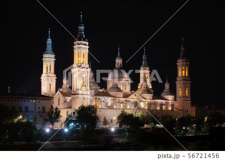 Night View Of The Basilica Of The Virgen Del Pilar And Ebro River, Zaragoza, Aragon, Spain. Night View Of The Basilica Of The Virgen Del Pilar And Ebro River, Zaragoza, Aragon, Spain. 56721456