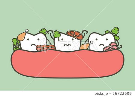 meat and vegetable stuck in teeth meat and vegetable stuck in teeth 56722609