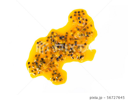 Closeup top view passion fruit seed drop on white Closeup top view passion fruit seed drop on white 56727645