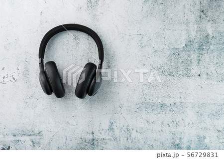Wireless Black Headphones on a gray stone 56729831