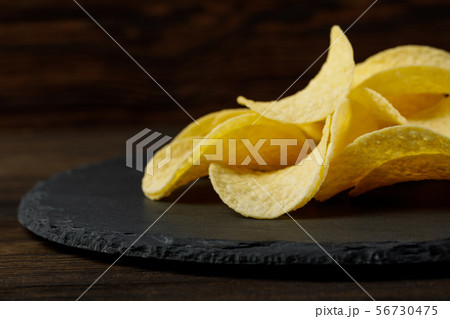 Salty delicious potato chips Salty delicious potato chips 56730475