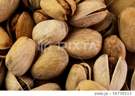 salted pistachios background. 56730513