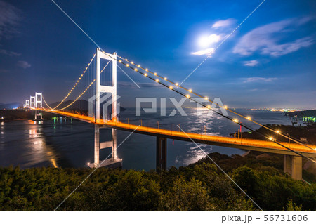 愛媛県 月夜の来島海峡大橋 ライトアップの写真素材