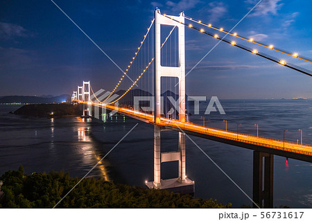 愛媛県 月夜の来島海峡大橋 ライトアップの写真素材