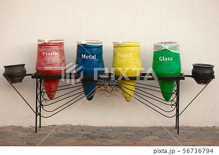 Four decorative trash bins in the form of vases for sorting of waste. The concept as it is possible Four decorative trash bins in the form of vases for sorting of waste. The concept as it is possible 56736794