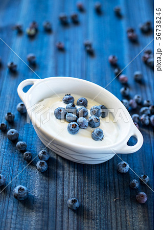 tasty blueberry fruits with cream 56738246