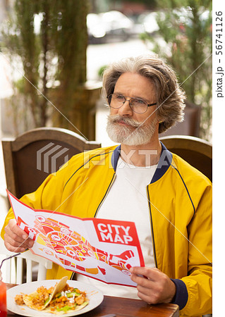 Man looking at the street before walking. Man looking at the street before walking. 56741126
