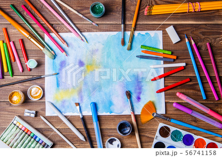 Painted paper, brushes, paints, colored pencils and prose stationery 56741158