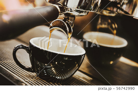 Espresso machine brewing a coffee. Coffee pouring 56742990