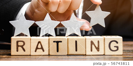 Businessman puts a fourth star Businessman puts a fourth star 56743811