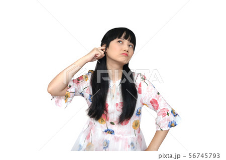 Cute Asian Girl Covering her Ears. Don't Want to 56745793