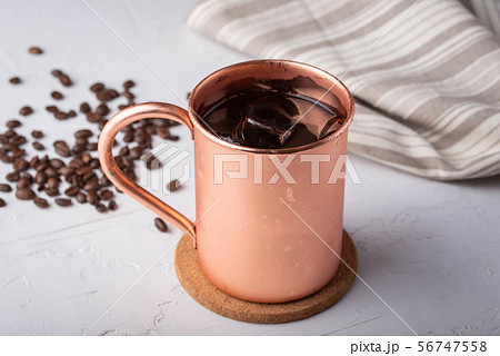cold brewed coffee in copper mug cold brewed coffee in copper mug 56747558