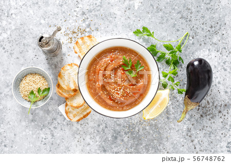 Eggplant hummus with ingredients for cooking Eggplant hummus with ingredients for cooking 56748762