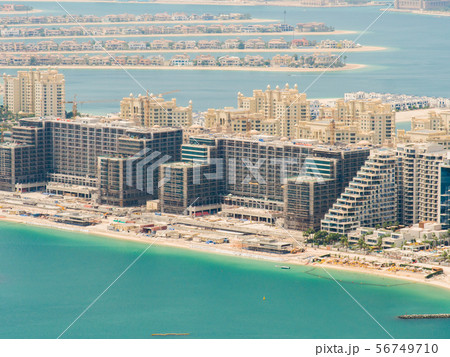 View on residential buildings on Palm Jumeirah island. The Palm Jumeirah is an artificial View on residential buildings on Palm Jumeirah island. The Palm Jumeirah is an artificial 56749710
