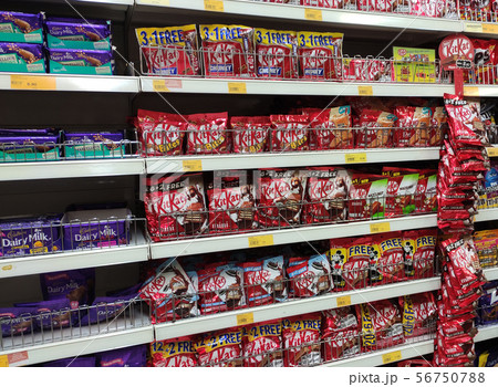Chocolate foods for sale in supermarket.  56750788