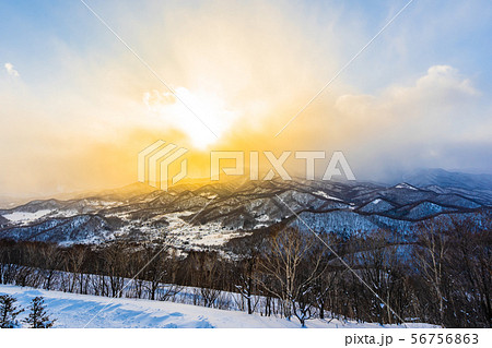 Beautiful landscape with mountain around tree in snow winter season at sunset time 56756863