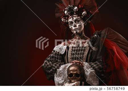 Halloween Girl in a Death Costume Halloween Girl in a Death Costume 56758749