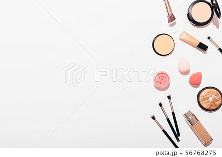 Side frame of makeup products on white background Side frame of makeup products on white background 56768275