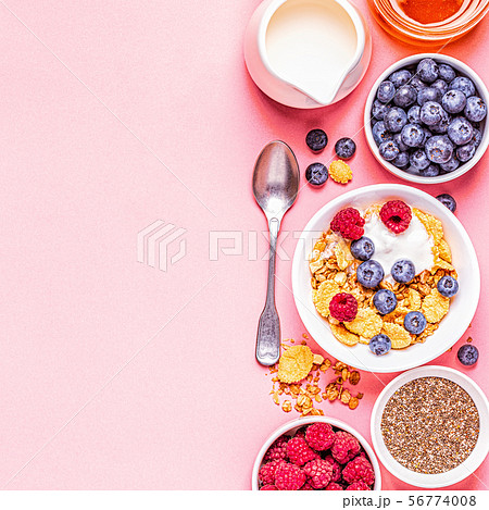 Healthy breakfast, muesli, cereal with fruit. 56774008