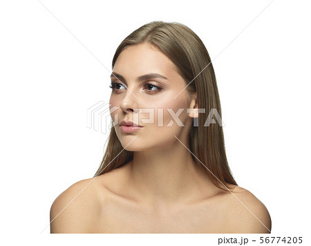 Portrait of beautiful young woman isolated on white studio background 56774205