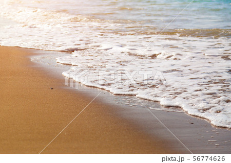 Sea waves wash sand. 56774626