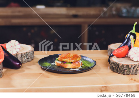 Chef making healthy vegetarian salmon burgers outdoor on open kitchen, odprta kuhna, international 56778469