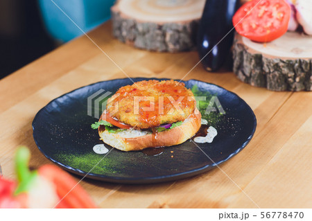 Chef making healthy vegetarian salmon burgers outdoor on open kitchen, odprta kuhna, international 56778470