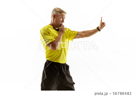 Football referee gives directions with gestures to players isolated on white background 56786482