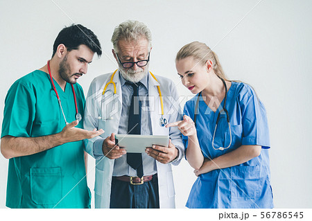 Group of doctor with tablet on white background 56786545