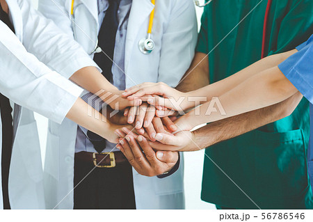 Teamwork doctor on white background 56786546
