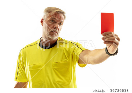 Football referee showing a red card to a displeased player isolated on white background Football referee showing a red card to a displeased player isolated on white background 56786653