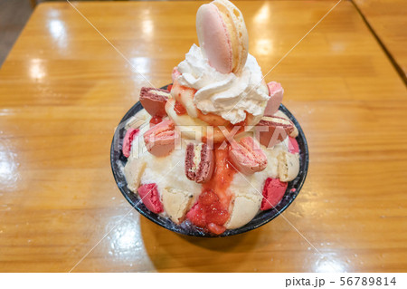 Bingsu or Bingsoo, Korean shaved ice dessert with macaron and whipping cream Bingsu or Bingsoo, Korean shaved ice dessert with macaron and whipping cream 56789814