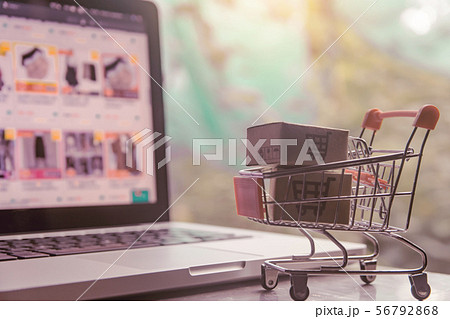 Shopping online concept - Parcel or Paper cartons Shopping online concept - Parcel or Paper cartons 56792868