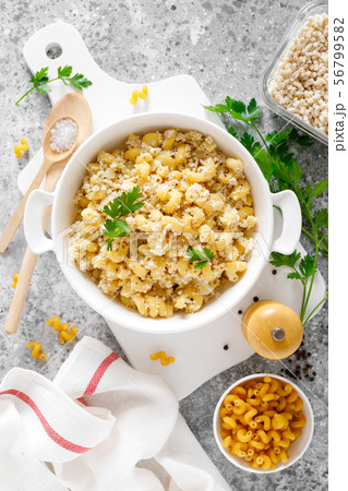 Makaroni po-flotski. Boiled pasta in navy-style 56799582