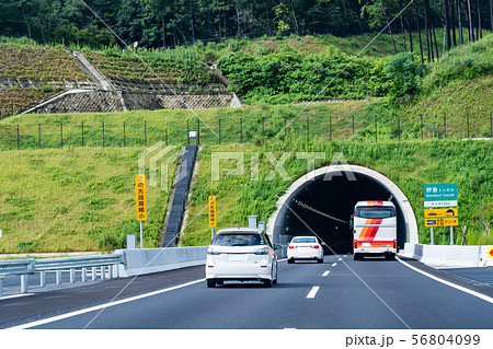 三重県 新名神高速道路を走行中のバス 野登トンネルの写真素材