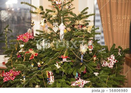 Beautiful christmas tree with  chritmas toys 56806980