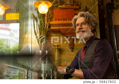 Thoughtful man sitting in the coffee shop. Thoughtful man sitting in the coffee shop. 56817832