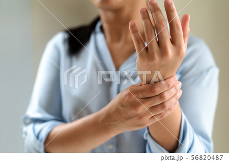 woman wrist arm pain long working. office syndrome 56820487