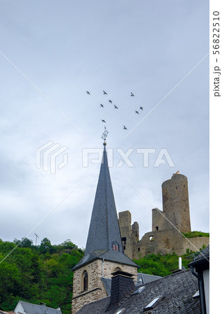 Pfarrkirche church and Lowenburg castle, Monreal 56822510