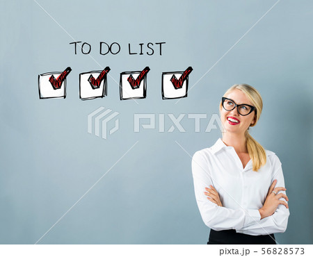 To do list with young woman 56828573