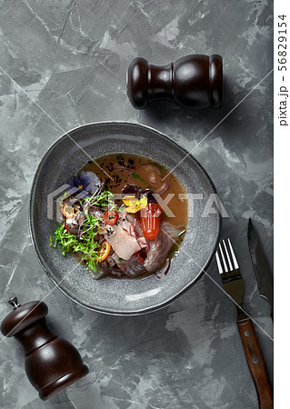 traditional peruvian food ceviche from seabass. Close-up, low key, gray background. Top view copy 56829154